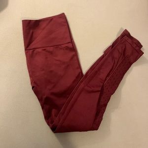 Fabletics burgundy leggings with calf details